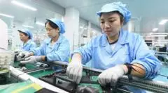 China's economic growth picks up as AI boom boosts exports