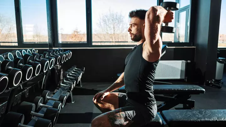 These Are the Only Two Dumbbell Exercises You Need to Build Size in Your Triceps, According to a Top Trainer