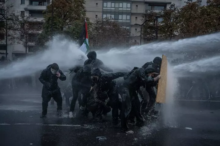 Videos Show Tear Gas, Fireworks Being Fired During Violent Paris Protests 
