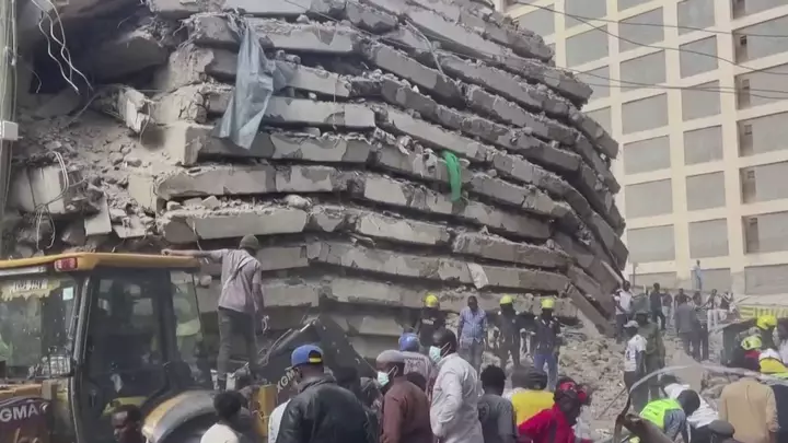 Search for survivors after high-rise collapse