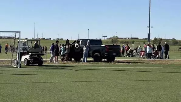 Two killed, including child, after vehicle ploughs into youth football match in Kansas
