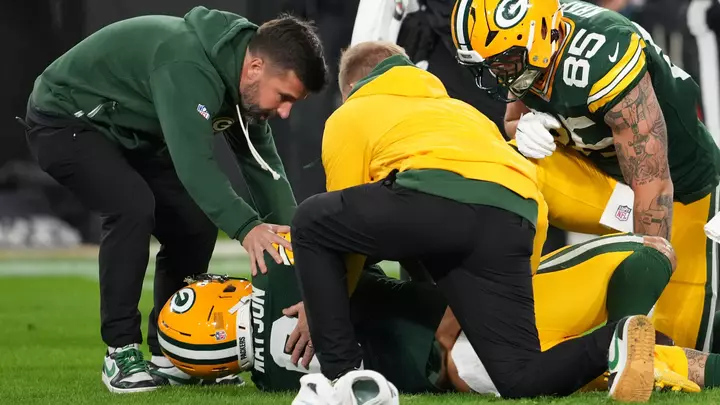 Packers' Christian Watson hospitalized with chest injury after posting 100-yard first half