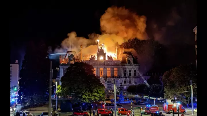 Buildings burn as French protests go into the night